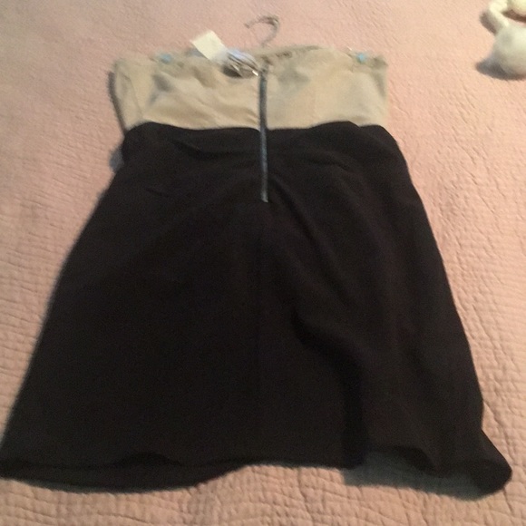 A fitting dress shoulder less too with ruffles. - Picture 2 of 2